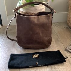 Nwt Frye Melissa Leather Khaki Brown Hobo Crossbody Shoulder Bag Retail $388 Bag Is New Without Tags. Absolutely Gorgeous! Perfect Color. Comes With Long Strap And Dust Bag. Can Be Worn As A Crossbody Or Over The Shoulder Or Elbow With The Shorter Strap. Last 2 Pictures Are To Show Size Only. Not Actual Bag. Scuffs Are Typical Of Frye Leather And Add It’s One Of A Kind Character. Smoke Free Home. See My Other Listings For More Frye Items. Slung Over Your Shoulder, The Melissa Hobo Is A Sight To Brown Leather Bag With Gunmetal Hardware, Brown Top Handle Shoulder Bag With Gunmetal Hardware, Everyday Leather-backed Crossbody Bucket Bag, Everyday Brown Shoulder Bag With Gunmetal Hardware, Brown Shoulder Bag With Gunmetal Hardware For Everyday, Everyday Oiled Leather Bag With Leather Backing, Leather Bucket Bag With Leather Handles For Fall, Leather Bucket Bag With Gunmetal Hardware, Leather Hobo Bag For Fall