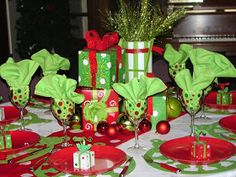 a table set for christmas with presents on it