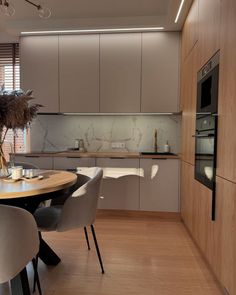 the kitchen is clean and ready to be used for dinner or breakfast time, as well as dining room furniture