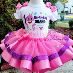 "Baby Shark First Birthday Tutu Outfit/ Birthday Shark Tutu Set/ Shark First Birthday Outfit/ Baby Shark Smash Cake/ Girl's Birthday Tutu Set DESCRIPTION WELCOME to J's Pretty Cute Designs We specialize in making extra full & extra fluffy tutu outfits, they are made with layers of high quality tulle and ribbon. The shirts that we use to elaborate our outfits are 100% cotton and are boutique quality shirts they are thick, very soft and they run true to size, please see the size chart before p Baby Shark Smash Cake, Shark Smash Cake, Baby Shark First Birthday, Shark First Birthday, First Birthday Tutu, Shark Girl, Smash Cake Girl, Shark Birthday Party, Outfit Birthday