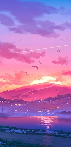 the sky is pink and purple with birds flying over it