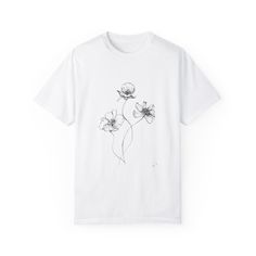 a white t - shirt with flowers drawn on it