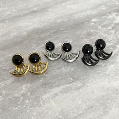 Unique and minimalistic Moon ear jacket earrings are perfect for every occasion. Earrings are sure to make a statement. Sold as pair Material :316 Stainless steel Gauge: 24G regular piercing Black circle stud : 10mm, can be worn alone, without back part Closure: Push pack Listing for pair of earrings only Minimalist Black Single Plug Earring, Black Minimalist Metal Cartilage Earrings, Modern Black Pierced Cartilage Earrings, Modern Black Cartilage Earrings, Minimalist Black Round Cartilage Earrings, Trendy Black Metal Cartilage Earrings, Black Minimalist Plug Earrings, Black Round Cartilage Earrings For Everyday Wear, Trendy Black Cartilage Earrings