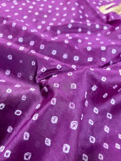 Handmade Semi Dupion Banarasi Silk Saree in Purple Color with Muted Gold Zari Weave Work. Please note - Color might look Light Purple in Sunlight and Dark Park in roomlight or dark light. Item : SareeBase Fabric : Semi Dupion Banarasi SilkColor : Purple Blouse piece : Comes with un-stitched Blouse piece.Blouse material : Dupion Banarasi SilkWork : HandwovenFall & Edging(Yes/No) : YesDisclaimer -:- Color variation is possible due to various reasons like phone or desktop setting, resolution etc. P Silk Bandhani Print Kurta For Navratri, Purple Silk Salwar Kameez For Navratri, Silk Purple Salwar Kameez For Festivals, Silk Salwar Kameez In Purple For Festivals, Purple Silk Salwar Kameez For Festivals, Purple Bandhani Print Traditional Wear For Diwali, Purple Bandhani Traditional Wear For Diwali, Diwali Purple Bandhani Traditional Wear, Purple Art Silk Saree With Bandhani Print