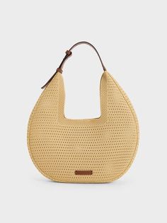 Beige Ida Knitted Hobo Bag | CHARLES & KEITH Versatile Natural Hobo Bag With Braided Handles, Modern Woven Leather Beach Bag, Modern Woven Hobo Bag With Double Handle, Modern Woven Leather Shoulder Bag For Beach, Modern Woven Double Handle Hobo Bag, Modern Woven Leather Beach Shoulder Bag, Versatile Natural Hobo Bag With Double Handle, Versatile Natural Color Hobo Bag With Double Handle, Modern Natural Hobo Bag For Everyday Use