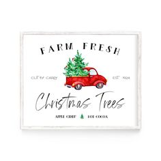 a red truck with a christmas tree in the back and farm fresh sign above it