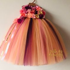 This stylish tee-length tutu dress and matching headband are perfect for dress-up, birthday parties, and weddings. The dress comes with a matching tutu for your little one's favorite Doll or stuffed animal. In total, you receive 3 items!! Item ships SAME DAY if ordered before 1:00 PM. This tutu dress puts the Royalty in Royality. It is a ready-to-wear customizable adorable tutu dress that is full and fluffy. The top is a halter that is tied with a satin ribbon. The skirt bottom can be tee-length, ankle-length, or knee-length. The dress can be made as two separate pieces (top and bottom), a one-piece, or transformable so you can choose when you would like to wear it as one piece or two. Sizes are based on a standardized chart.  **Please contact me if you have any further questions or would Pink Tutu Dress For Summer Costume Party, Pink Summer Tutu Dress For Costume Party, Spring Princess Dress With Tulle For Costume Party, Spring Princess Dress In Tulle For Costume Party, Spring Tulle Princess Dress For Costume Party, Whimsical Multicolor Princess Dress For Wedding, Multicolor Tulle Tutu Dress For Wedding, Pink Tulle Dress For Costume Party, Pink Tulle Skirt Dress For Costume Party