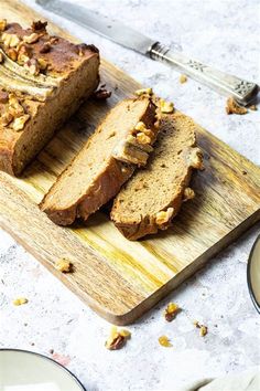 sliced loaf of banana nut bread on a cutting board