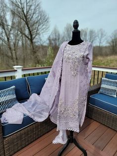 Khadi net shirt with all over pearls,beads,threadwork. Paired with khani net Embroidered dupatta and pure silk pant. Lavender Wedding Set With Sheer Dupatta, Elegant Lavender Dupatta With Intricate Embroidery, Elegant Lavender Embroidered Dupatta, Elegant Lavender Sets For Festive Occasions, Elegant Lavender Festive Sets, Elegant Festive Lavender Sets, Lavender Semi-stitched Sets With Intricate Embroidery, Elegant Lavender Dupatta For Festive Occasions, Elegant Lavender Dupatta For Party