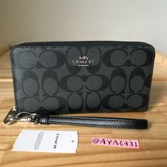 100% Authentic Coach Wallet C4452 Signature Long Zip Around Wallet Strap Graphite Black And Silver Hardware Brand New With Tags 7.5” X 4” Coach Formal Pouch Wallet, Black Coach Wallet, Coach Wallets For Women, Coach Wallets, 18th Bday, Bags Coach, Coach Wallet, Black And Silver, Silver Hardware