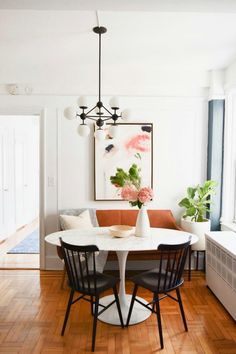 the instagram page shows an image of a dining room with chairs and a table