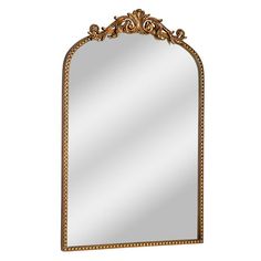 an ornate gold framed mirror on a white background