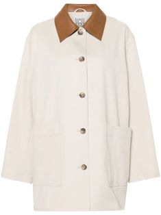 Shop TOTEME contrasting-collar twill shirt jacket White Lapel Collar Shacket For Workwear, Chic White Shacket For Workwear, White Cotton Shacket For Work, White Outerwear With Patch Pockets For Work, Neutral Shacket For Workwear, Single Breasted Collared Shacket For Work, Collared Shacket For Work, Cream Outerwear With Lapel Collar And Patch Pockets, Collared Single-breasted Shacket For Workwear