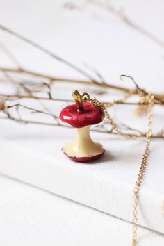 A Charm Painting Red Apple Necklace. Miniature and cute modern hand crafted jewelry. Charming and Interesting Pendant is made of Brass Premium Quality and Painted with Enamel for Durability. Apple Everyday Necklace goes with Every Fashion Outfit. Let's have Fun. Jewelry Details : -Approximate Apple Charm Size : 1.8x2.8x1.8 cm. -Various Chain Length Available : Please use drop down box to give order information. -Charm is made of brass with Gold-plated on the Chain -Lobster clasp -Jewelry comes i Cute Hand Painted Red Jewelry, Cute Red Hand Painted Jewelry, Cute Red Hand-painted Jewelry, Whimsical Red Hand Painted Jewelry, Red Whimsical Jewelry For Gift, Whimsical Red Jewelry For Gift, Artistic Red Necklace For Gift, Whimsical Red Jewelry For A Gift, Handmade Cherry Jewelry For Gift