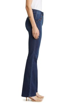 Button-trimmed pockets add to the chic feel of stretch-denim jeans featuring a flared leg and a fit system that's designed to comfortably shape and hold. 33 1/2" inseam; 20" leg opening; 10" front rise; 12" back rise (size 8) 91% cotton, 8% polyester, 1% spandex Machine wash, tumble dry Imported Classic Mid-rise Flare Jeans With Button Closure, Classic High Waist Flare Jeans With Button Closure, Fitted Dark Wash Bottoms With Snap Buttons, Fitted Denim Blue Bottoms With Snap Buttons, Fitted Denim Blue Jeans With Snap Buttons, Fitted Medium Wash Flare Jeans With Button Closure, Mid-rise Button Closure Flare Jeans For Fall, Classic Dark Wash Flare Bottoms, Mid-rise Flare Jeans With Button Closure For Fall