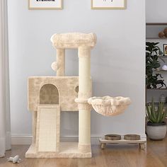 a cat tree in the corner of a room