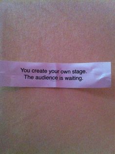 a piece of paper that has some type of message on it with the words you create your own stage