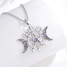 Connect with divine energy and bring your magic to life with this stunning Triple Moon Pentagram Necklace. Crafted with hypoallergenic sterling silver that's free of nickel, lead, and cadmium, this Wicca Pagan Jewelry is made to last—letting you enjoy its beauty for years! Have confidence in its high-quality and show up to the world, looking simply magical ☪️ Pendant Size: 35.6*26.6mm；Weight:6.5g; Chain size: 18 inch ( 46cm) ,Chain width 1.1 mm Package: Package Included (To Choose one of 3 Diffe Triple Moon Pentagram, Triple Goddess Necklace, Magical Pendant, Pentacle Jewelry, Moon Pentagram, Pentagram Jewelry, Spooky Jewelry, Pentacle Necklace, Moon Pentacle