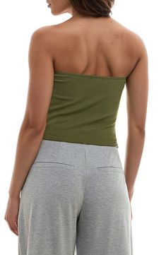 A softly ribbed construction provides versatile comfort to this wardrobe staple tube top. 95% nylon, 5% spandex Machine wash, line dry Imported Stretch Strapless Top With Seamless Construction, Seamless Stretch Strapless Tops, Versatile Stretch Tube Top In Solid Color, Casual Ribbed Bandeau Crop Top, Ribbed Stretch Sleeveless Tube Top, Casual Ribbed Strapless Tube Top, Ribbed Stretch Tube Top, Stretch Ribbed Tube Top, Solid Stretch Bandeau Top