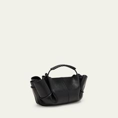 HEREU "Arta" top handle bag in leather  Top handle  Adjustable crossbody strap, 47.2"L Can be worn as a top handle or crossbody bag  Open top with magnetic closure  Approx. 7.1"H x 7.9"W x 6.7"D Item Weight (Lbs.): 1.1 Made in Spain Designer Top Handle Satchel With Rolled Handles, Modern Handheld Bags With Rolled Handles, Evening Bucket Bag With Top Carry Handle, Evening Handheld Bucket Bag With Top Carry Handle, Top Handle Shoulder Bag With Leather Handles, Chic Handheld Shoulder Bag With Rolled Handles, Handheld Leather Bucket Bag With Top Carry Handle, Luxury Evening Satchel With Rolled Handles, Evening Satchel With Rolled Top Handles