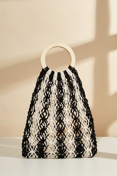 Step up your accessory game with the Black & White Stripe Open Knit Bag! Its contemporary design and striking monochrome pattern add a bold touch to any ensemble, making it the perfect statement piece. Product code: CAC12B4E002AC Features:  Material: 100%COTTON. Trendy Black Crochet Bag For Shopping, Spring Shopping Black Crochet Bag, Black Crochet Bag For Shopping In Spring, Black Crochet Bag For Spring Shopping, Trendy Black Crochet Bag, Chic Black Crochet Bag For Spring, Chic Black Crochet Bag For Shopping, Modern Crochet Bag For Summer, Modern Black Woven Bag