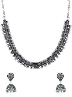 This jewellery set consists of a necklace and a pair of earrings Oxidized silver-plated necklace, has Kolhapuri work, has a chain secured with S-hook closure Comes with a matching pair of jhumka earrings, secured with a push and back closure Size & Fit Dimensions Of Necklace: 46.5 cm x 1.5 cm (Length x Width) Dimensions Of Earrings: 4.5 cm x 1.5 cm (Length x Width) Each Material & Care Material: German Silver Plating: Silver-Plated Care Instructions: Wipe your jewellery with a soft cloth after every use Always store your jewellery in a flat box to avoid accidental scratches Keep sprays and perfumes away from your jewellery Do not soak your jewellery in water Clean your jewellery using a soft brush, dipped in jewellery cleaning solution only Dispatch within 7 days Silver Temple Jewelry Sets, Festive Sterling Silver Jewelry Sets, Traditional Silver Jewelry Sets With Matching Earrings, Silver Necklaces With Matching Earrings For Festive Occasions, Silver Necklace With Matching Earrings For Festive Occasions, Ornate Silver Jewelry Sets With Intricate Design, Festive Silver Jewelry Sets With Oxidized Finish, Festive Silver Necklaces With Matching Earrings, Festive Silver Necklace With Matching Earrings