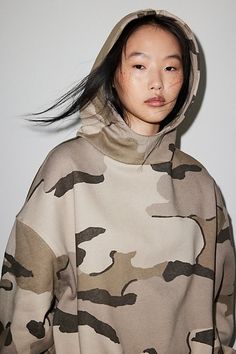 So cool Out From Under hoodie sweatshirt in a slouchy, oversized fit. Designed in an all-over camo print fabric featuring a draped neckline & hood, balloon sleeves and side pockets. Only at Urban Outfitters. Features Out From Under Ryan camo hoodie sweatshirt Oversized hoodie sweatshirt All-over camo print knit Draped cowl neckline and hood with drop shoulders & balloon sleeves Side pockets Oversized, relaxed fit Regular length Easy pull-over style UO exclusive Content + Care 58% Cotton, 42% polyester Machine wash Imported Size + Fit Model in Neutral is 5’7.5" and wearing size Small Measurements taken from size Small Chest: 51" Length: 26" | Out From Under Ryan Camo Hoodie Sweatshirt in Neutral, Women's at Urban Outfitters Military Long Sleeve Hoodie For Fall, Military Style Long Sleeve Hoodie For Fall, Camouflage Hoodie Sweatshirt For Fall, Camouflage Drawstring Hood Sweatshirt For Fall, Camouflage Sweatshirt With Drawstring Hood For Fall, Fall Camouflage Sweatshirt With Drawstring Hood, Camouflage Cotton Hoodie For Fall, Khaki Military Hoodie For Fall, Military Style Khaki Hoodie For Fall