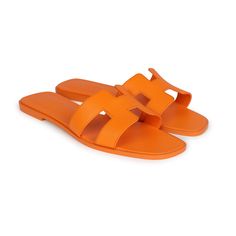 This pair of Oran sandals are in Orange Sunset epsom leather, H cutout detail, Natural leather insole, natural leather sole, in size 42 EU.Origin: ItalyCondition: New and never wornAccompanied by: Hermes box, dustbagsSize: 42 EU Orange Sandals With Rubber Sole For Spring, Spring Orange Sandals With Rubber Sole, Designer Leather Sandals For Vacation, Modern Calf Leather Slides For Summer, Summer Slip-on Slides In Calf Leather, Summer Calf Leather Slip-on Slides, Open Heel Slides With Leather Sole For Vacation, Classic Summer Calf Leather Slides, Vacation Slides With Leather Sole And Open Heel