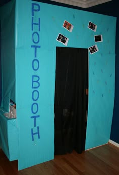 a blue photo booth with pictures on it