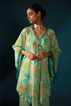 Buy Blue Chinon Chiffon Printed Shaded Asymmetric Kaftan Kurta And Pant Set For Women by Basil Leaf Online at Aza Fashions. Bollywood Style Kaftan With Printed Motifs, Navratri Dress With Back Tassel Tie-up, Green Sets With Tassels For Navratri, Green Tassel Sets For Navratri, Bohemian Floral Print Kaftan For Designer Wear, Bohemian Designer Kaftan For Summer, Bohemian Designer Summer Kaftan, Bollywood Green Sets With Tassels, Green Bollywood Sets With Tassels