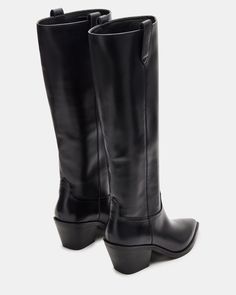 The STALLION boot is expertly crafted and designed with a pointed toe and knee-high length for a sleek and stylish look. These Western-inspired riding boots offer both durability and comfort for any riding or fashion needs. 2.5 inch heel height Size 6 measurements: 15 inch shaft circumference, 14.5 inch shaft height Size 8 measurements: 16.75 inch shaft circumference, 15.25 inch shaft height Size 10 measurements: 17.5 inch shaft circumference, 16 inch shaft height Leather upper material Textile Knee High Western Boots, Western Boots Women, Aesthetic Style, Western Boot, 5 Inch Heels, Western Boots, Aesthetic Fashion, Women's Boots, Riding Boots