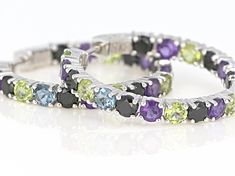 .54ctw round London blue topaz, 2.13ctw round African amethyst, 2.30ctw round Manchurian Peridot™ and 3.26ctw round black spinel, sterling silver inside/outside hoop earrings. Measure approximately 1.29"L x .16"W. Latch back closures. White Gold Round Multi-stone Gemstones, Multicolor Round Gemstones With Prong Setting, Luxury Round Gemstone Hoop Earrings, Luxury Hoop Multi-stone Jewelry, Luxury Round Hoop Earrings With Gemstones, Luxury Multi-stone Hoop Jewelry, Round Multi-stone Cubic Zirconia Gemstones, Modern Multi-stone Round Cut Jewelry, Round Amethyst Gemstones With Accents