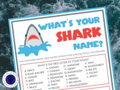 a sign with the words what's your shark name?