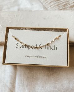 This dainty choker necklace is lovely on its own or layered with other necklaces -Non-tarnish, hypoallergenic 14 Karat Gold Filled All designs and photos owned by Stamped and Finch, LLC. Delicate Layered Choker Necklace For Gift, Dainty Layered Choker Necklace For Gift, Dainty Layered Choker Necklace As Gift, Simple Chain Choker Necklace As Gift, Delicate Chain Layered Choker Necklace As Gift, Dainty Layered Necklace With Satellite Chain, Minimalist Layered Necklace With Adjustable Delicate Chain, Dainty Adjustable Charm Necklaces With Satellite Chain, Dainty Adjustable Layered Necklace As Gift