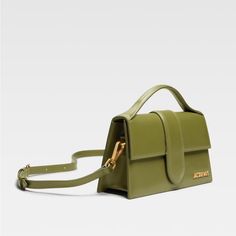 New - Khaki Jacquemus Le Grand Bambino Bag Crossbody Flap Bag - Smooth Leather Structured Bag - Padded Top Handle - Magnetic Flap Tab Closure - Long Removable Strap - Engraved Lobster Clip - Patch Pocket On The Back - Topstitched Details - Gold Metal Logo And Hardware - Fully Lined In Cotton - Dyed Edges - 23.5 X 13 Cm Chic Green Rectangular Flap Bag, Green Rectangular Flap Bag For Evening, Green Satchel Flap Bag For Evening, Chic Green Flap Bag With Adjustable Strap, Designer Rectangular Satchel With Adjustable Handle, Designer Rectangular Shoulder Bag With Adjustable Handle, Evening Green Double Handle Satchel, Luxury Rectangular Flap Bag With Adjustable Handle, Green Evening Box Bag