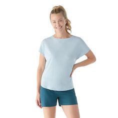 Keep the breeze coming during your next walk, hike, or stroll through town with the Women's Short Sleeve Swing Top in Winter Sky Heather size M. Organically grown cotton meets the performance of Merino wool to help you stay comfortable, dry, and less stinky. The keyhole vent detail on the back adds breathability, while the scooped bottom hem elevates the style of this relaxed, ready-to-move top. | Winter Sky, Official Store, Model Measurements, Merino Wool, Apparel Accessories, Organic Cotton, Perfect Fit, Socks, Relaxed Fit