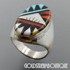 LESLIE GLADYS LAMY ZUNI STERLING SILVER MOSAIC MULTI GEMSTONE INLAY OVAL RING 10 ITEM SPECIFICS METAL SILVER METAL STAMP/HALLMARKLLG STERLING SIZE 10 WIDTH ( inches / mm ) 1.12 / 28.5 WEIGHT ( gram )21.3 Jewlery Rings, Indian Jewelry Earrings, Native American Rings, Ring Size 10, Native Jewelry, Stone Inlay, Oval Ring, Oval Rings, Blue Band