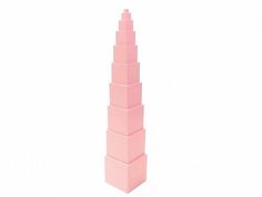 a tall pink tower made out of lego blocks