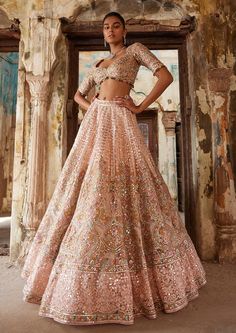 Editor's Note This stunning light pink net lehenga set features intricate embroidery in resham, foil, gota, and mirror, making it a standout piece for any special occasion. The heavily embroide... Orang India, Designer Bridal Lehenga, Net Lehenga, Red Lehenga, Embroidered Lehenga, Indian Lehenga, Indian Couture, Wedding Lehenga, Indian Wedding Outfits