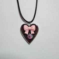 This necklace adds the perfect touch of creepy/cute to your alternative style <3 Handmade with love and one of a kind! The cord itself is imitation leather made from waxed cotton. It is 18 inches long  and has an extra 2 inches of chain to adjust the length to your liking. Goth Kawaii Accessories, Kawaii Goth Necklaces, Yami Kawaii Necklaces, Pastelgoth Accessories, Creepy Cute Jewelry, Goth Pastel Outfits, Clay Coquette, Goth Resin, Weird Accessories