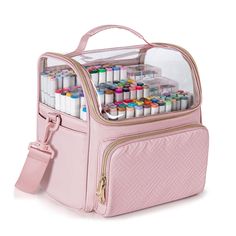 a pink bag filled with lots of different types of crayon pens and markers