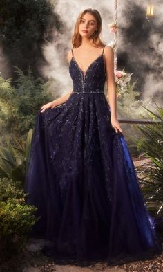 Navy blue v-neck a-line ball gown with open back. Elegant V-neck Gown With Corset Back, Evening V-neck Dress With Corset Back, Blue V-neck Prom Gown, Elegant V-neck Ball Gown For Gala, Fitted Bodice V-neck Evening Dress For Gala, Blue Evening Gown With Corset Back, Fitted V-neck Ball Gown For Evening, Blue V-neck Evening Dress With Sweep Train, Evening Blue Gown With Corset Back