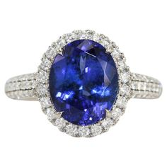 Ladies tanazanite and diamond ring with platinum setting. Stamped Pt 950 and weighs 6.9 grams. The tanzanite is a 4.00 carat oval shape, spectacular violet blue color. The side diamonds are round brilliant cuts, .50 total carats, h, i, j color, mostly Vs clarity, good cuts. Ring size is a 6 and can be sized, up or down, one full size or less for an extra fee. Excellent workmanship. Platinum Diamond Ring, Platinum Diamond Rings, Platinum Ring, Gem Stone, Cocktail Rings, Oval Shape, Diamond Ring, Platinum, Violet