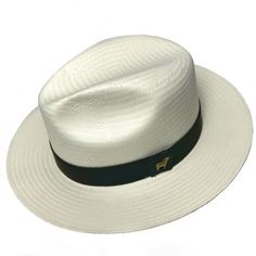 The Brooks was born a summer time staple. Looks great with the brim flipped up, down or half way, you can't go wrong either way. Made from super-fine toyo straw the lightweight and durable structure will block the sun and haters! 3" brim that can be flipped up or down. Non adjustable sweatband. Summer Fedora With Short Brim For Everyday, Classic White Adjustable Straw Hat, Uv Protection Panama Hat With Curved Brim, Adjustable Fit Summer Hat Upf 50+, White Adjustable Classic Straw Hat, Toquilla Straw Fedora With Curved Brim, Adjustable Fit Short Brim Hat With Upf 50+, White Toquilla Straw Hat With Flat Brim, Classic White Panama Hat For Beach