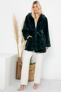 Indulge in luxurious style with our Emerald Green Faux Fur Belted Long Sleeve Coat. The deep emerald green color adds a regal touch while the faux fur and belted waist provide both warmth and a flattering silhouette. Elevate your outerwear game with this premium coat. Regular Size Coat Long Sleeves High Quality Faux Fur Waist Self Belt & Pocket Open Front & Fully Lined Model Size: Height: 5'10 / Bust: 34" / Waist: 24" Model Is Wearing Size: Small Bust: 41" Length: 34" Brand Size Dress Bust Waist Winter Green Belted Outerwear, Green Outerwear With Belted Cuffs And Long Sleeves, Green Long Sleeve Outerwear With Belted Cuffs, Green Faux Fur Coat With Faux Fur Trim, Green Faux Fur Coat For Fall, Green Faux Fur Trim Coat For Fall, Green Fur Coat With Faux Fur Trim For Fall, Winter Green Faux Fur Outerwear, Green Faux Fur Long Sleeve Outerwear