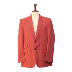 This Chiragh Apparel Blazer Is An Elegant Upgrade On Dapper Tailoring And Features Rich Shades In A Sumptuous Fabric For Elegant Opulence. Fashioned From Premium Quality Cotton, This Striped Blazer Features Full Lining In Japanese Silk, A Notch Lapel, Two-Button Closure And Single-Vented Back. A Left Chest Pocket And Three Flap Pockets Appoint The Front While The Inside Has Two (2) Pockets On The Left And One (1) Pocket On The Right. A Flash Of Contrast Piping Is Added To The Jacket Lining Insid Red Festive Semi-formal Blazer, Elegant Single Breasted Orange Blazer, Tailored Orange Single-breasted Blazer, Formal Fitted Orange Outerwear, Orange Fitted Formal Outerwear, Spring Orange Tailored Suit, Formal Orange Notch Lapel Outerwear, Formal Orange Outerwear With Notch Lapel, Formal Orange Single Breasted Blazer