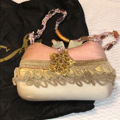 Nwot Never Used Designer Handheld Evening Bag With Top Handle, Designer Handheld Evening Bag With Top Carry Handle, Designer Evening Bag With Detachable Handle, Designer Evening Pouch With Top Carry Handle, Designer Handheld Evening Bag With Detachable Strap, Designer Beige Clutch With Detachable Strap, Designer Evening Bag With Removable Pouch, Cream Rectangular Shoulder Bag For Evening, Cream Rectangular Shoulder Bag For Evenings