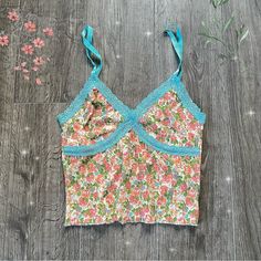 Sweet Floral Crop Top With A Bright Pop Of Blue And Perfect For Summer Brand: Wild Fable Size:Xs Colors: Blue, White, Pink, Green Condition: Never Worn, No Noticeable Flaws Summer Multicolor Bra-friendly Tops, Multicolor Bra-friendly Tops For Summer, Fitted Cotton Camisole With Floral Print, Fitted Floral Print Cotton Camisole, Multicolor Tank Top For Summer Loungewear, Vintage Summer Top With Built-in Bra, Summer Vintage Top With Built-in Bra, Vintage Spring Camisole, Cute Fitted Floral Print Camisole