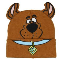 Get ready to solve mysteries in style with this Scooby-Doo beanie. The brown Scooby-colored beanie features an embroidered face and collar design with 3D ears. Scooby's friendly face is instantly recognizable to fans of all ages, which brings this beloved cartoon character to life. This beanie is made with high-quality materials designed for comfort and durability. Whether you're a die-hard Scooby-Doo enthusiast or just looking for a fun and cozy accessory, this beanie is a must-have. Novelty Cap Beanie One Size Fits Most, Novelty One Size Fits Most Cap Beanie, Novelty One-size-fits-most Beanie Cap, Trending Hats, Style Beanie, Straw Visor, Cozy Accessories, Embroidered Face, Embroidered Collars