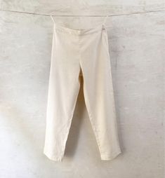 m o d e l  HUMA women's pull-on pants in handwoven handspun organic cotton. light, comfortable and versatile  - elastic at back of waist  - side pockets  f a b r i c doubled karunganni cotton: handspun and handwoven indigenous Indian organic cotton  c o l o u r - natural white (kora) s i z e s length all sizes 37,5'' which can be extended 2'' through letting down the hem XXS waist    26'' hip       44'' XS waist    28'' hip       46'' S waist    30'' hip        48'' M waist    32'' hip        50 Pull On Pants, Trousers Women, Hand Woven, Capri Pants, Hand Weaving, Organic Cotton, Pants For Women, Trousers, Clothes For Women